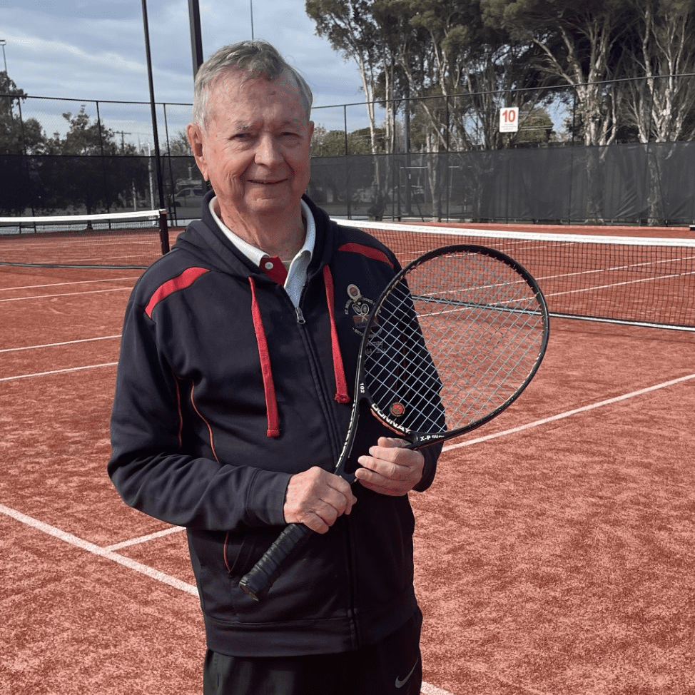 Peter playing tennis